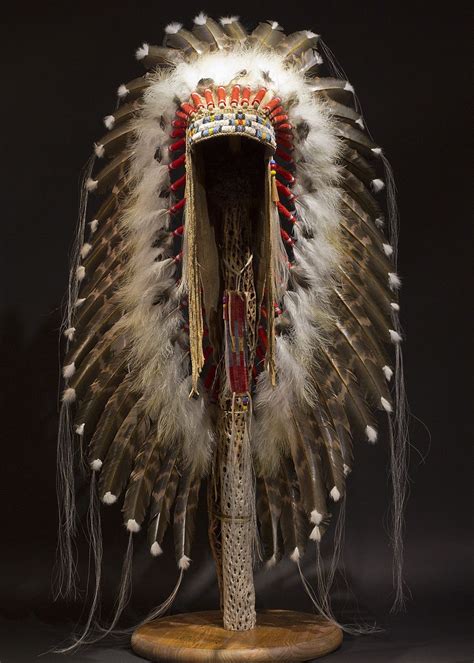 how to make indian headdress|person wearing a feather headdress.